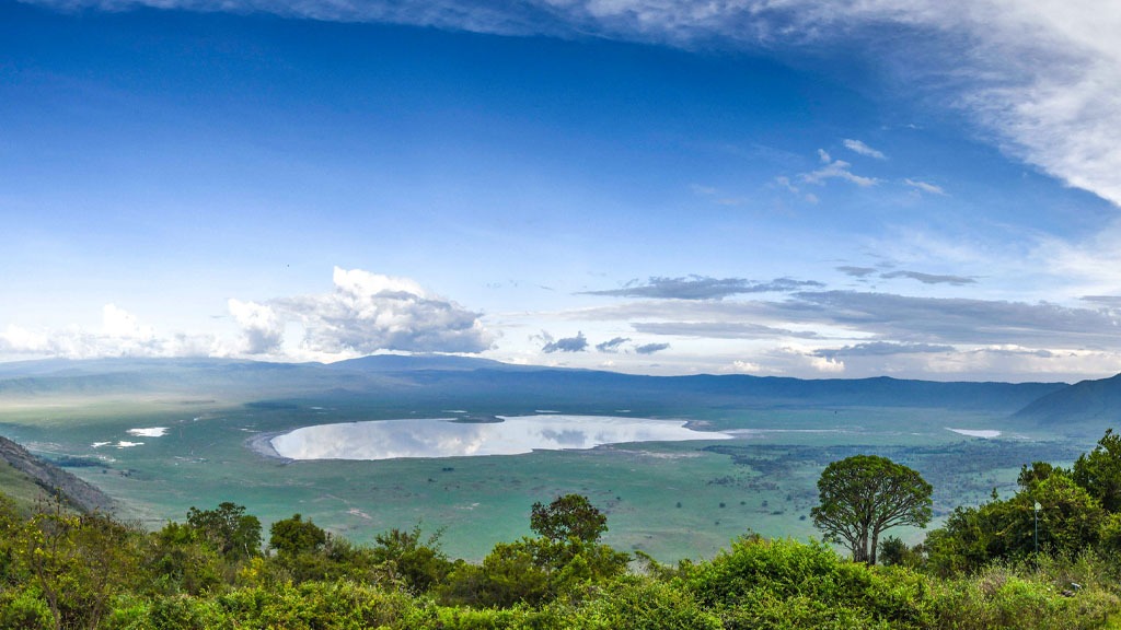 Aerial view of Ngorongoro Crater – “Ngorongoro Crater panoramic view of volcanic caldera in Tanzania